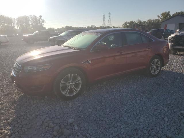 FORD TAURUS SEL 2015 with VIN 1FAHP2E8XFG194938 - Photo from auction