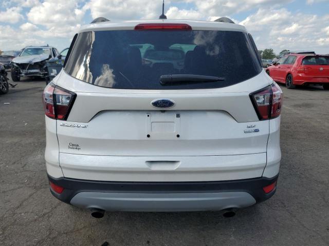 Photo 6 from auction – 2017 FORD ESCAPE SE with VIN 1FMCU9GD0HUE62931