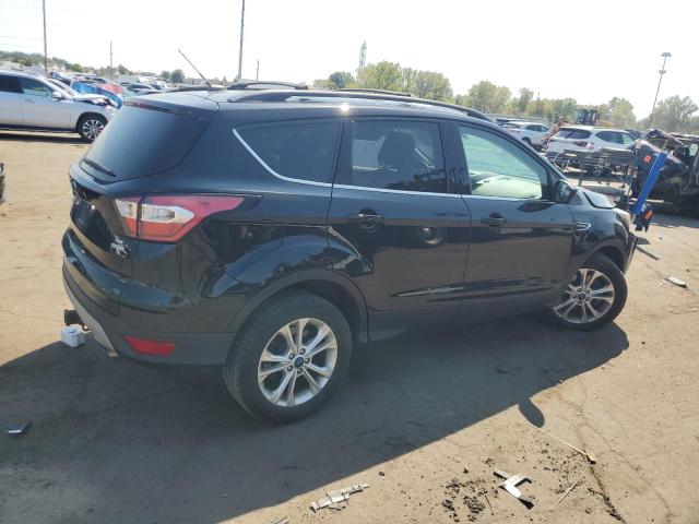 Photo 3 from auction – 2017 FORD ESCAPE SE with VIN 1FMCU0G96HUC94459