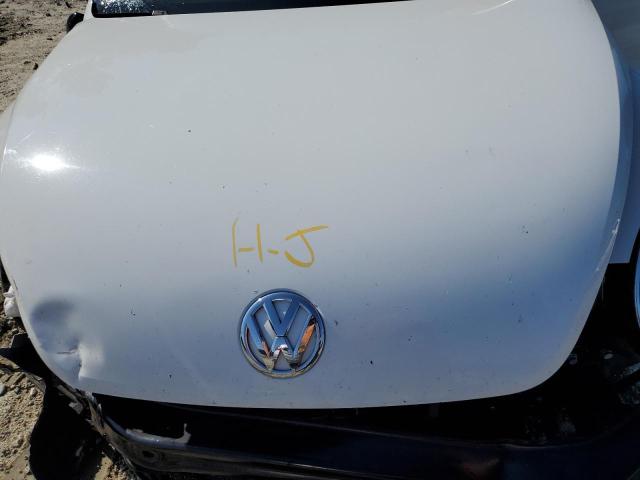 Photo 11 from auction – 2012 VOLKSWAGEN BEETLE with VIN 3VWFP7AT5CM644292