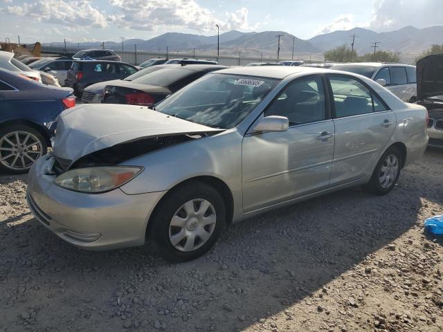 TOYOTA CAMRY LE 2002 with VIN JTDBE32K120097738 - Photo from auction