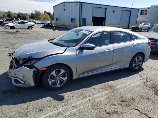 HONDA CIVIC LX 2020 with VIN 19XFC2F61LE216864 - Photo from auction