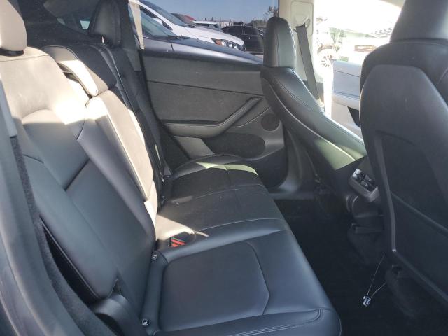 Photo 11 from auction – 2023 TESLA MODEL Y with VIN 7SAYGDEE8PF697555