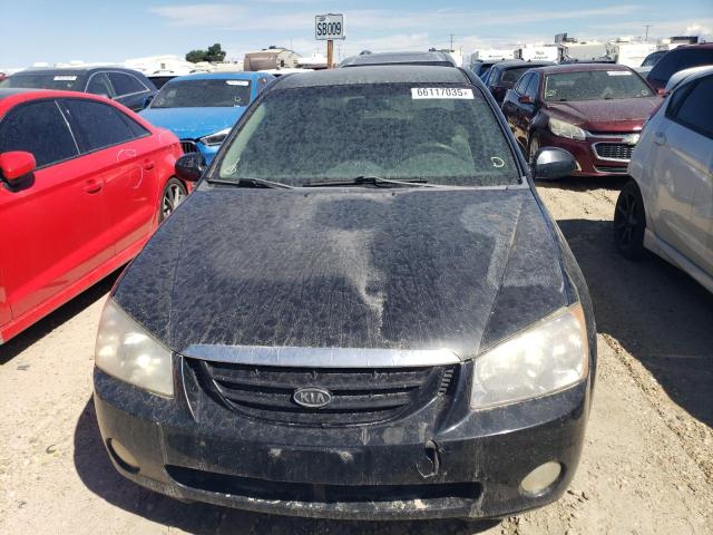 Photo 5 from auction – 2004 KIA SPECTRA LX with VIN KNAFE121745014037