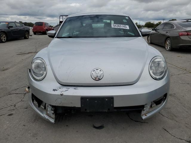 Photo 5 from auction – 2013 VOLKSWAGEN BEETLE with VIN 3VWJP7AT9DM686248
