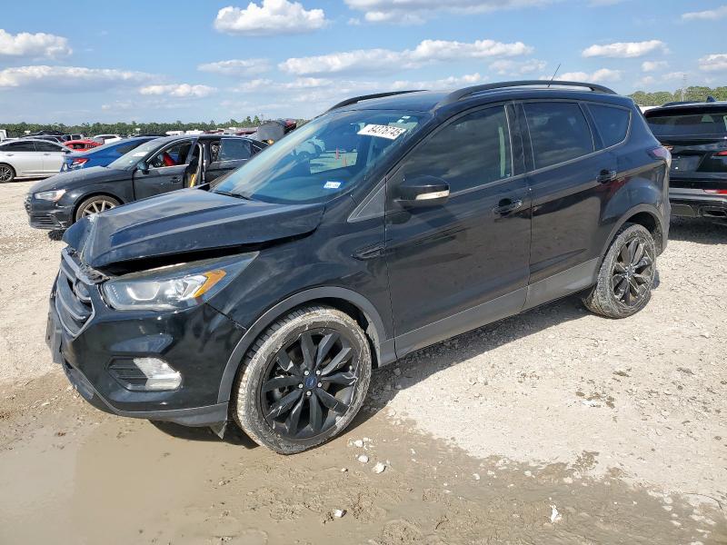 FORD ESCAPE TIT 2017 with VIN 1FMCU0J98HUF06898 - Photo from auction