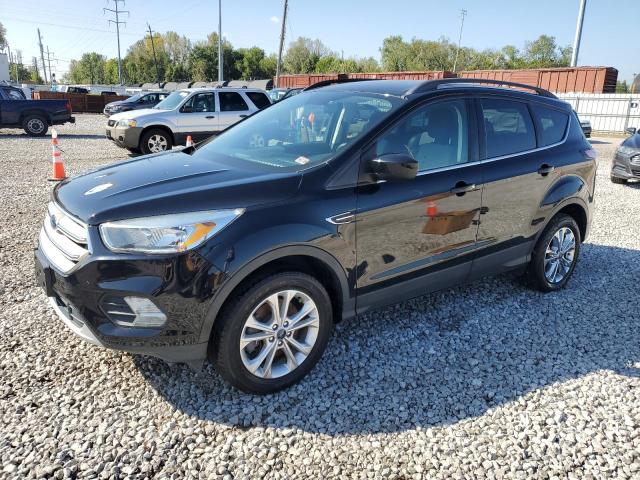 FORD ESCAPE SE 2018 with VIN 1FMCU9GD3JUB75864 - Photo from auction