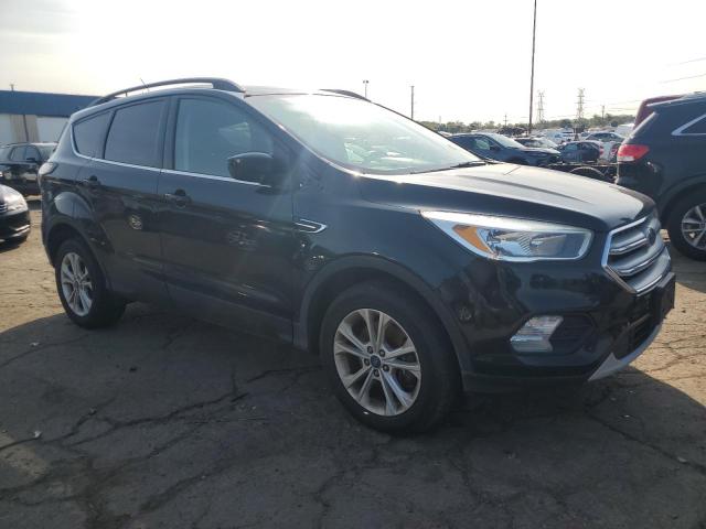 Photo 4 from auction – 2018 FORD ESCAPE SE with VIN 1FMCU9GDXJUB08503