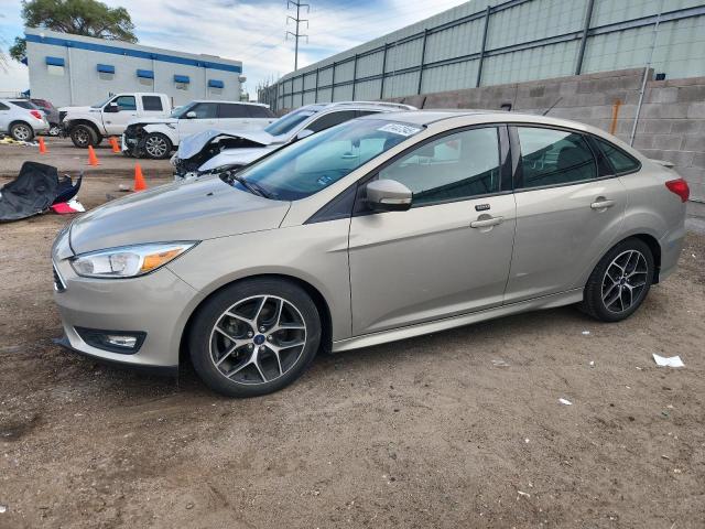 FORD FOCUS SE 2015 with VIN 1FADP3F27FL220563 - Photo from auction