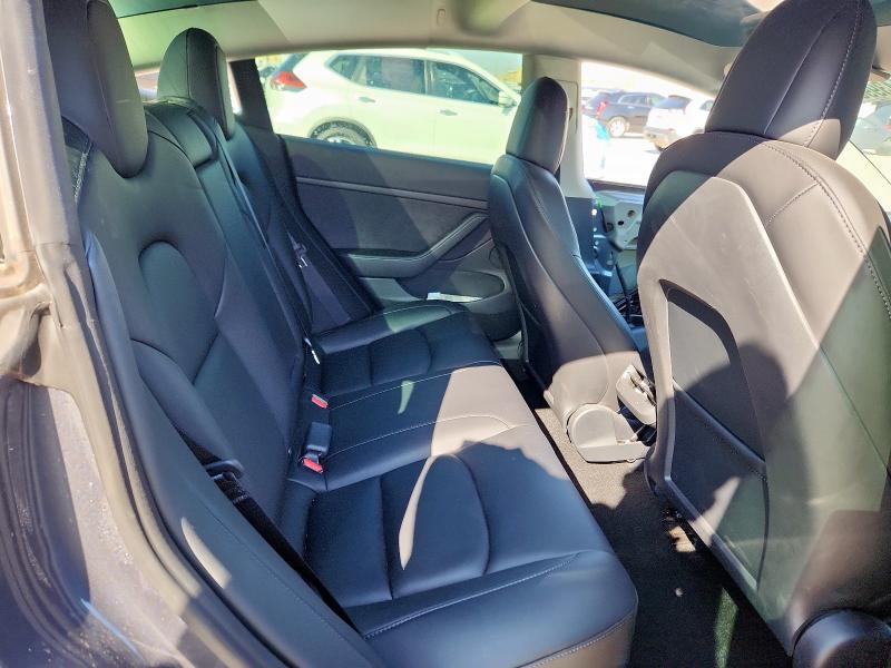 Photo 11 from auction – 2022 TESLA MODEL 3 with VIN 5YJ3E1EB5NF119444