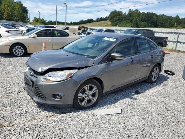 FORD FOCUS SE 2014 with VIN 1FADP3F24EL368118 - Photo from auction