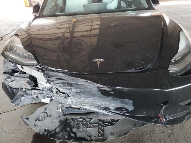 Photo 11 from auction – 2018 TESLA MODEL 3 with VIN 5YJ3E1EA9JF155266