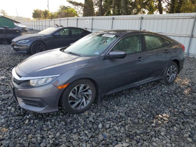 Photo 1 from auction – 2017 HONDA CIVIC EX with VIN 2HGFC2F7XHH509877