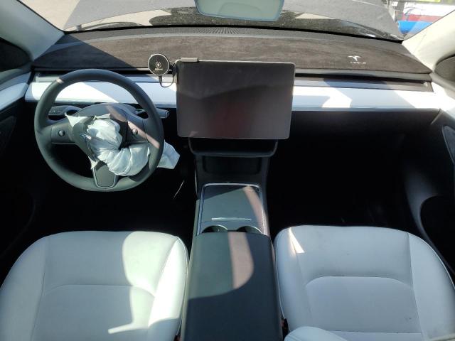 Photo 8 from auction – 2023 TESLA MODEL Y with VIN 7SAYGDEE7PF948274