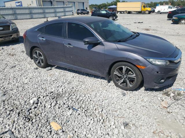 Photo 4 from auction – 2016 HONDA CIVIC with VIN 19XFC1F91GE006064