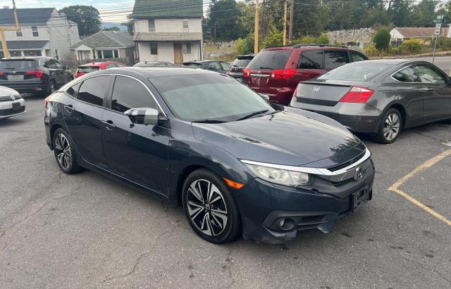 HOND CIVIC EX 2016 with VIN 19XFC1F33GE208299 - Photo from auction