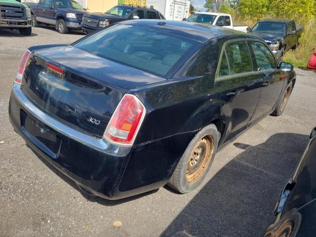 Photo 4 from auction – 2013 CHRYSLER 300 with VIN 2C3CCAAG2DH714739