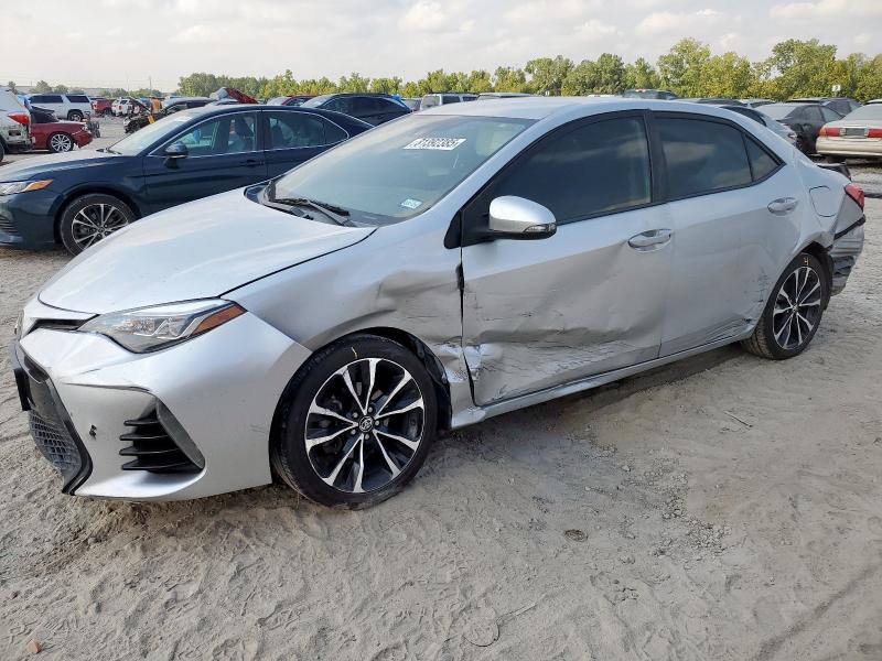 TOYOTA COROLLA L 2018 with VIN 5YFBURHE8JP766339 - Photo from auction