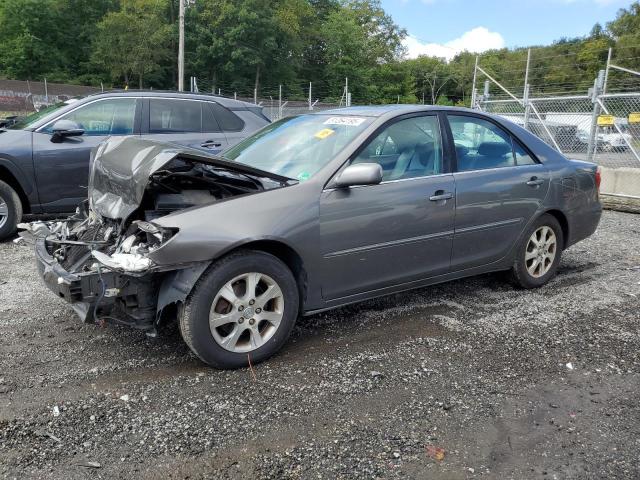 TOYOTA CAMRY LE 2005 with VIN 4T1BF30K25U606132 - Photo from auction
