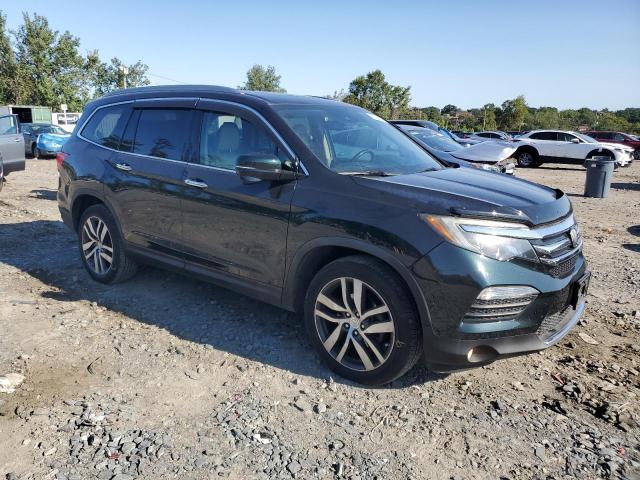 Photo 4 from auction – 2016 HONDA PILOT TOURING with VIN 5FNYF6H98GB029281