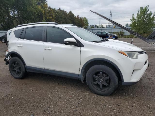 Photo 4 from auction – 2017 TOYOTA RAV4 LE with VIN 2T3BFREV2HW654666