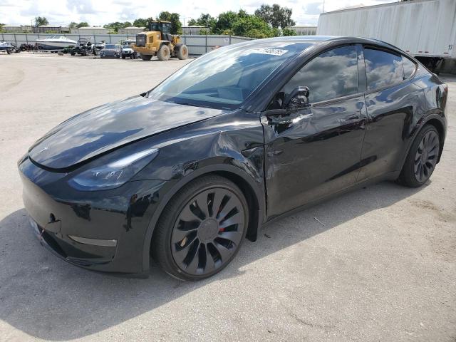 TESLA MODEL Y 2024 with VIN 7SAYGDEF1RA304651 - Photo from auction