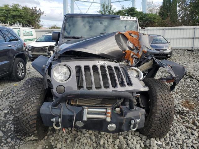 Photo 5 from auction – 2016 JEEP WRANGLER U with VIN 1C4BJWEG1GL157110