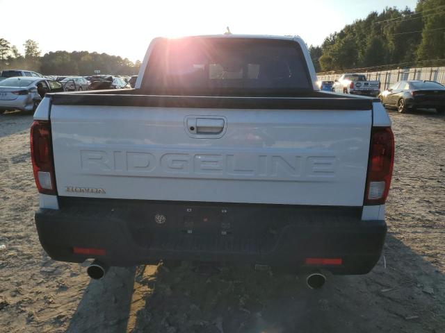 Photo 6 from auction – 2024 HONDA RIDGELINE with VIN 5FPYK3F51RB011841