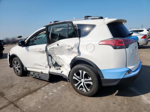 Photo 2 from auction – 2018 TOYOTA RAV4 LE with VIN JTMZFREV2JJ161704