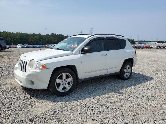 JEEP COMPASS SPORT 2010 with VIN 1J4NF4FB8AD505986 - Photo from auction