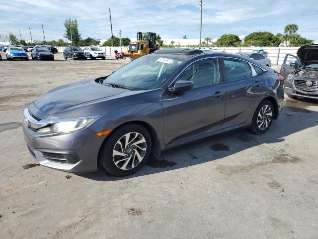 HONDA CIVIC EX 2017 with VIN 2HGFC2F71HH567392 - Photo from auction