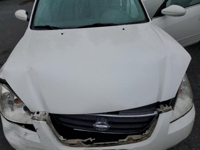 Photo 11 from auction – 2003 NISSAN ALTIMA BAS with VIN 1N4AL11D93C287205