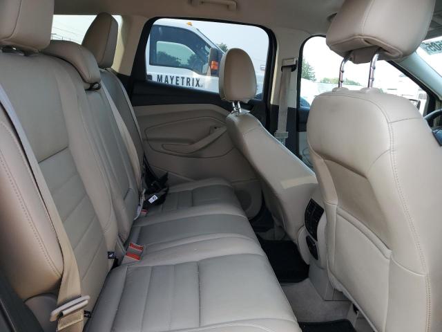 Photo 11 from auction – 2014 FORD ESCAPE with VIN 1FMCU9J95EUD64462