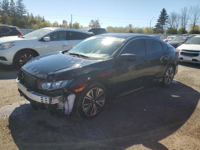 HONDA CIVIC EX 2018 with VIN 2HGFC1F40JH104147 - Photo from auction