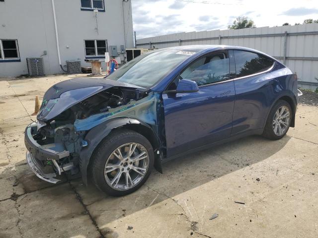 TESLA MODEL Y 2023 with VIN 7SAYGDEE4PF610802 - Photo from auction