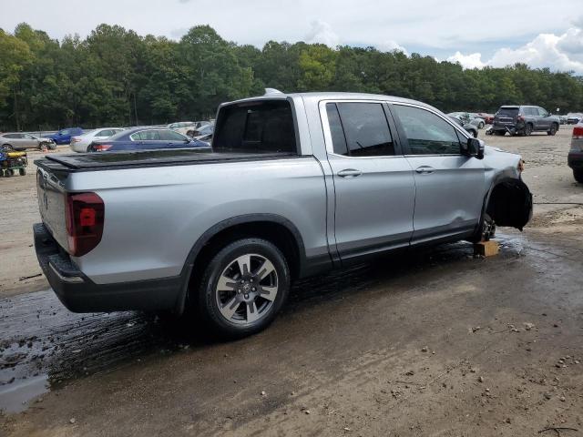 Photo 3 from auction – 2019 HONDA RIDGELINE with VIN 5FPYK2F67KB006796