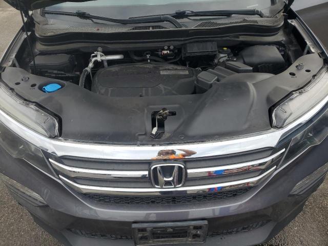 Photo 12 from auction – 2018 HONDA PILOT LX with VIN 5FNYF6H17JB054304