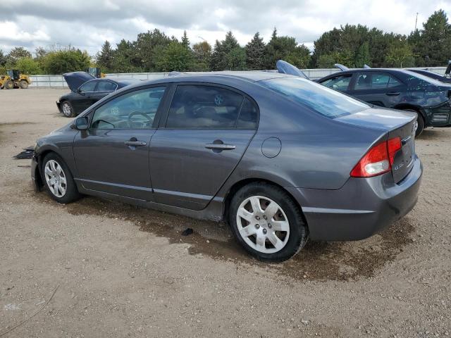Photo 2 from auction – 2010 HONDA CIVIC LX with VIN 19XFA1F52AE014121