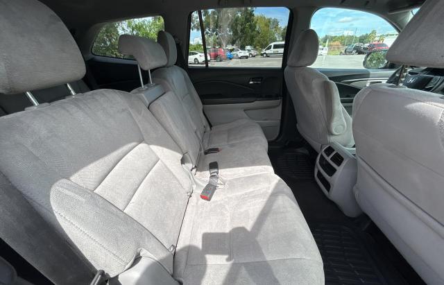 Photo 6 from auction – 2020 HONDA PILOT LX with VIN 5FNYF5H19LB005473