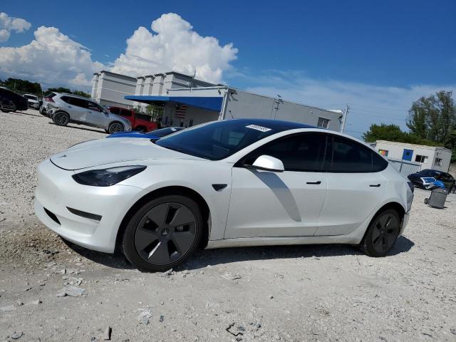 TESLA MODEL 3 2023 with VIN 5YJ3E1EA9PF620878 - Photo from auction