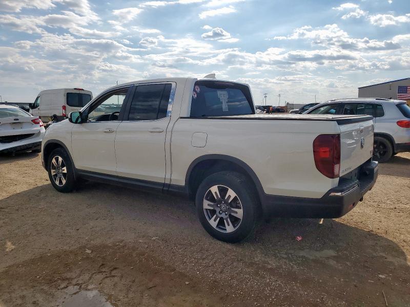 Photo 2 from auction – 2017 HONDA RIDGELINE with VIN 5FPYK3F56HB038290