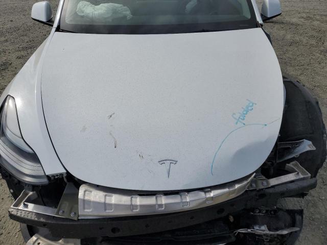 Photo 11 from auction – 2023 TESLA MODEL Y with VIN 7SAYGAEEXPF894323