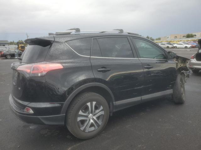 Photo 3 from auction – 2018 TOYOTA RAV4 LE with VIN 2T3ZFREV7JW480727