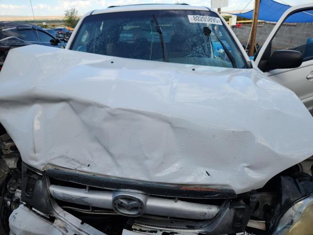 Photo 12 from auction – 2002 MAZDA TRIBUTE with VIN 4F2YU09102KM51326