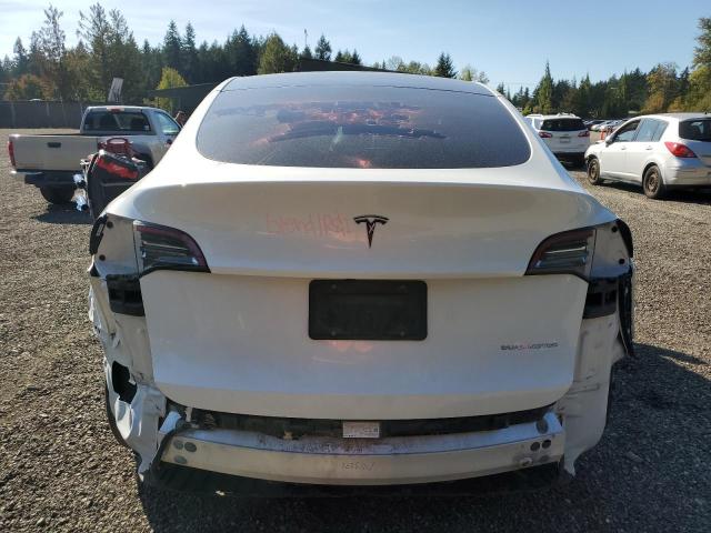 Photo 6 from auction – 2020 TESLA MODEL Y with VIN 5YJYGDEE2LF053475