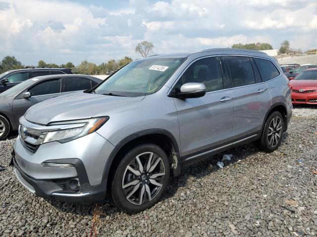 Photo 1 from auction – 2022 HONDA PILOT TOUR with VIN 5FNYF5H62NB034375