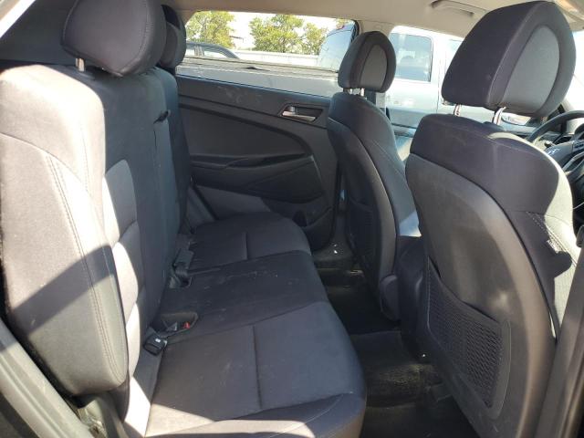 Photo 11 from auction – 2018 HYUNDAI TUCSON SE with VIN KM8J2CA41JU783692