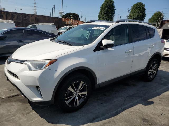 TOYOTA RAV4 XLE 2017 with VIN 2T3WFREV8HW324127 - Photo from auction