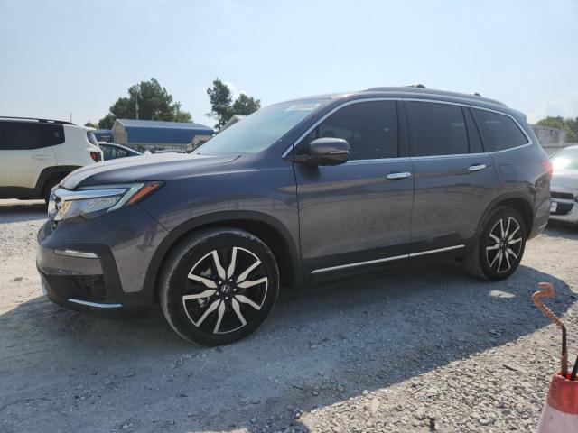 HONDA PILOT TOURING 2020 with VIN 5FNYF5H65LB000170 - Photo from auction