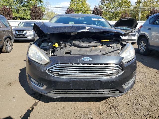 Photo 5 from auction – 2016 FORD FOCUS TITA with VIN 1FADP3N28GL210269